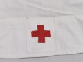Deutsches Rotes Kreuz, weiße Schwesternhaube, gebraucht mit diversen Flecken