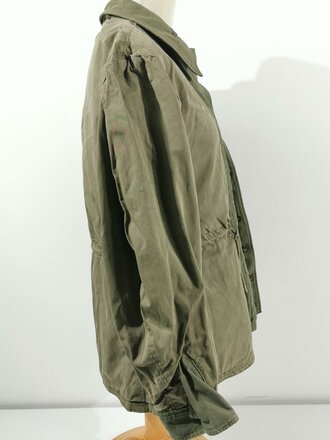 U.S. WWII M43 field jacket. Used, label faded, size Medium