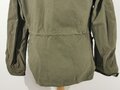 U.S. WWII M43 field jacket. Used, label faded, size Medium