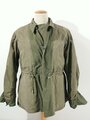 U.S. WWII M43 field jacket. Used, label faded, size Medium