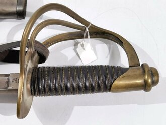 U.S. Civil War, Cavalry Saber and steel Scabbard, Model 1860, made by Ames Manufacturing Company Chicopee Massachusetts, 110 cm (43"), dated 1862, good condition, with sword knot?