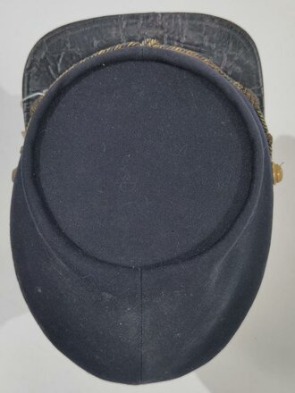 U.S. Civil War era?, Cadet Cap Kepi with Eagle Insignia, "Ridabock Company", visor buttons with "New York" (?) coat of arms, used condition, moth holes