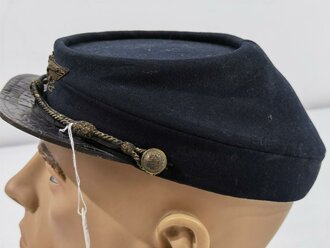 U.S. Civil War era?, Cadet Cap Kepi with Eagle Insignia, "Ridabock Company", visor buttons with "New York" (?) coat of arms, used condition, moth holes