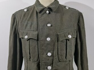 Feldbluse für Mannschaften des Heeres Modell 1940. Stark getragenes Kammerstück, Schulterbreite: 49 cm Armlänge: 62 cm