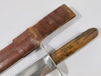 Bowie Knive with bone made handle shells and leather scabbard, "B&D", Blade 23 cm, total length 36 cm, good condition