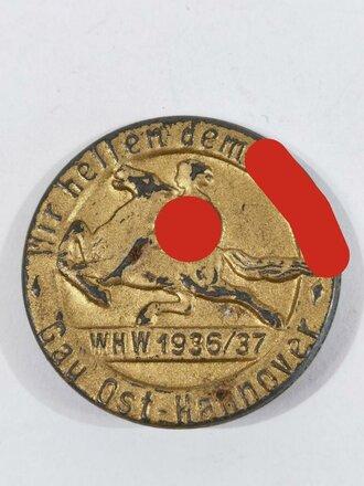 Blechabzeichen NSV, "Wir helfen dem Führer Gau Ost-Hannover WHW 1936/7", ca. 2,5 cm, guter Zustand