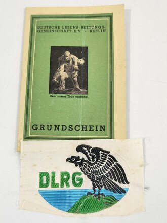 Leistungsschein "DLRG Grundschein" mit Stoffabzeichen, Berlin 04.11.1943, ausgestellt auf einen Oberfähnrich, gebraucht, DIN A6