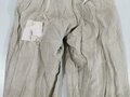 Heer, Winterwendehose graugrün auf weiß, getragenes Stück mit diversen Reparaturstellen