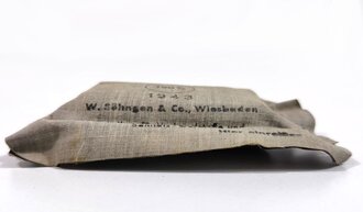 Verbandpäckchen Wehrmacht für die Tasche in der Feldbluse bzw. den Verbandkasten. Kleines Modell datiert 1943
