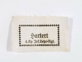 Wäscheetikett für einen Angehörigen  der "4. Kp.Inf. Lehr-Rgt.", ca. 3,5 x 6 cm, Textil, neuwertig