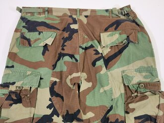 U.S.Pants, hot weather, woodland camouflage pattern, combat. Used, size Large