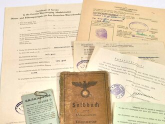 Kriegsgefangenschaft, Soldbuch eines Angehörigen der Kriegsmarine mit Royal Navy Identity Card, Dienst- und Führungszeugnis aus dem Deutschen Minenräumdienst sowie "Certificate of Discharge" aus engl. Kriegsgefangenschaft 1947 etc., ca. DIN A5, gebraucht