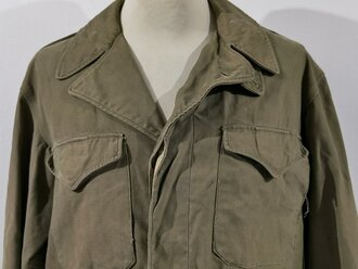 U.S. WWII, first pattern M-1943 field jacket, well used,...