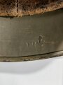 Stahlhelm Modell 1940 der Wehrmacht, bei der Dänischen Armee weiterverwendet, dort neu lackiert und mit Abzeichen versehen.