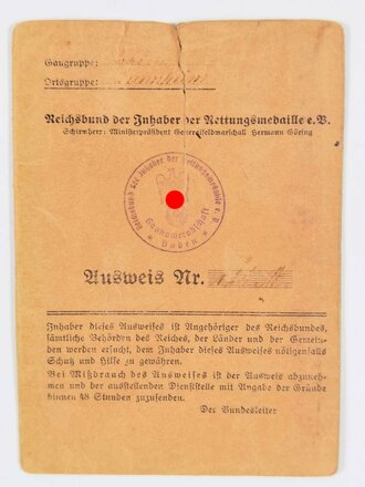 Reichsbund der Inhaber der Rettungsmedaille e.V.,  Ausweis eines Leutnant d. R. a. D (Frontkämpferkreuz und EK II), Gaukameradschaft Baden, Mannheim, 11. Februar 1942, ca. 10,5 x 15 cm, gebraucht, eingerissen