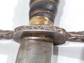 Antiker Linkhanddolch, Alter und Herkunft unbekannt. Klinge und Parierstange zusammengehörig, der Rest dazugebastelt. Gesamtlänge 47cm