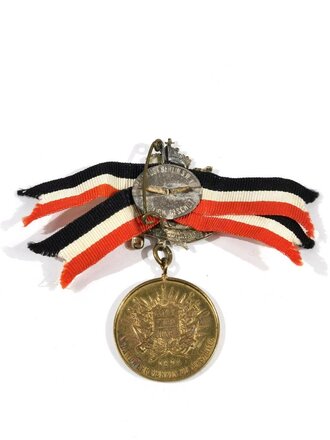 Deutscher Krieger Bund, Verbandsabzeichen mit Band und Medaille "Landwehr Verein zu Meseritz - Wilhelm II. Kaiser von Deutschland - Gott Mit Uns - 1874", 30 mm, guter Zustand