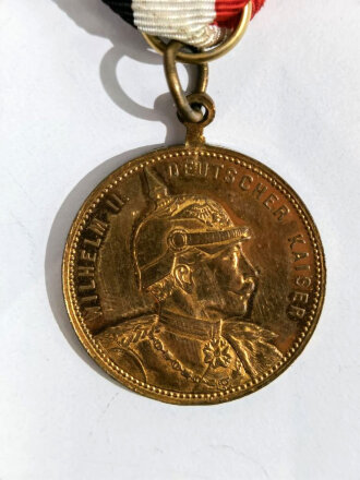 Kaiserreich, Medaille "Zum Andenken an das 19. Braunschweiger Landwehr-Verbandsfest z. Schöningen - 7.8.9. Juli1894", Vorderseite "Wilhelm II. Deutsche Kaiser", ca. 28 mm, guter Zustand, das Band ist eien neuzeitliche Anfertigung