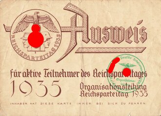 NSDAP "Ausweis für aktive Teilnehmer des Reichsparteitages 1935" eines Politischen Leiters aus Saarbrücken, 10,5 x 17,5 cm, gebraucht