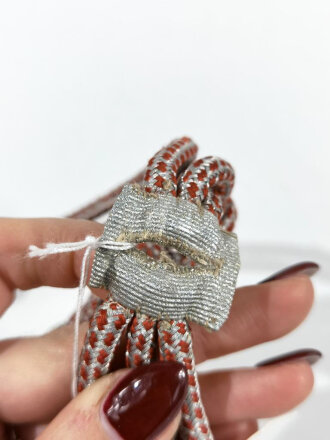 Heer, Paradefangschnur für einen Musikmeister, silberfaden mit roten Durchzügen. guter Zustand, selten