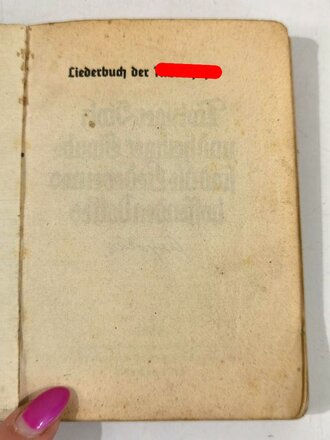 "Liederbuch der Nationalsozialistischen Deutschen Arbeiterpartei" mit 123 Seiten, datiert 1937, stärker gebraucht