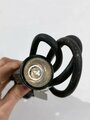 Anstecklampe aus dunkelbrauner Preßmasse mit Gummiummanteltem Kabel und Stecker, Funktion nicht geprüft