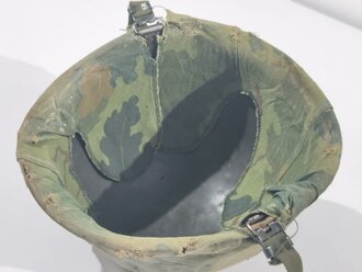 U.S. Vietnam era steel helmet. WWII front seam shell original painted, Liner dated 69, Mitchell pattern cover. Well used helmet