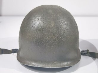 U.S. Vietnam era steel helmet. WWII front seam shell original painted, Liner dated 69, Mitchell pattern cover. Well used helmet