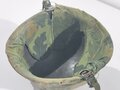 U.S. Vietnam era steel helmet. WWII front seam shell original painted, Liner dated 69, Mitchell pattern cover. Well used helmet