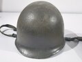 U.S. Vietnam era steel helmet. WWII front seam shell original painted, Liner dated 69, Mitchell pattern cover. Well used helmet