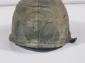 U.S. Vietnam era steel helmet. WWII front seam shell original painted, Liner dated 69, Mitchell pattern cover. Well used helmet