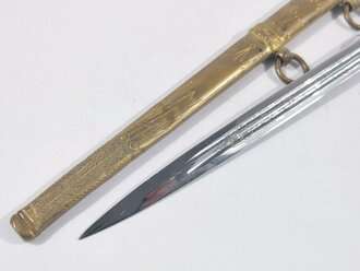 Kriegsmarine, Dolch für Offiziere von Eickhorn Solingen mit beidseitiger Klingenätzung,  getragenes Stück, die Griffwicklung fehlt. Ungereinigtes Stück