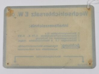 Beschriftungsfeld zum Wechselrichtersatz EW.c1 der Wehrmacht aus Kunststoff. Originalstück, guter Zustand