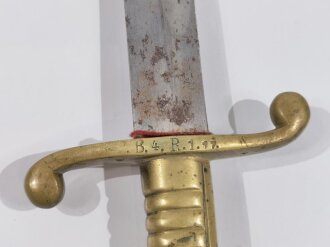 Faschinenmesser Bayern Modell 1830,  komplett mit Scheide und Koppelschuh, die Parierstange mit Kammerstück mit Regimentsstempel. Sogenannter Jägersäbel , geätzte Klinge mit Treuespruch, Parierstange bauchig ausgeformt, Scheide nicht geschrumpft