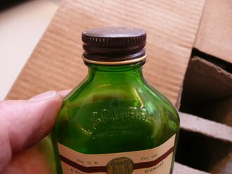 US Army WWII, Mounthwash, Squibb Antiseptic Solution, unopened bottle, out of the original 1944 dated box, 1 piece