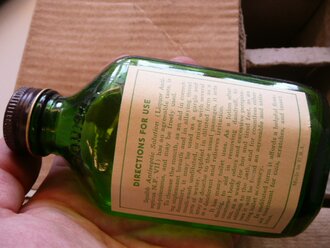 US Army WWII, Mounthwash, Squibb Antiseptic Solution, unopened bottle, out of the original 1944 dated box, 1 piece